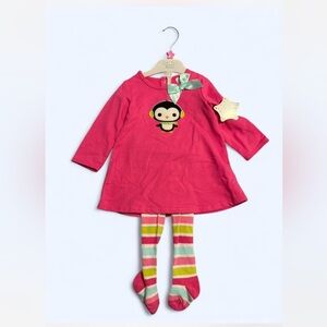 Pink Dress with Penguin Design and Striped Leggings